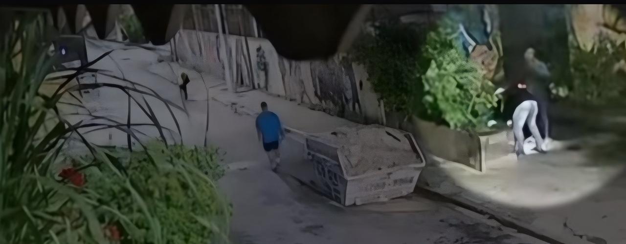 casal-e-flagrado-abandonando-corpo-de-bebe-em-cacamba-de-lixo;-veja-video