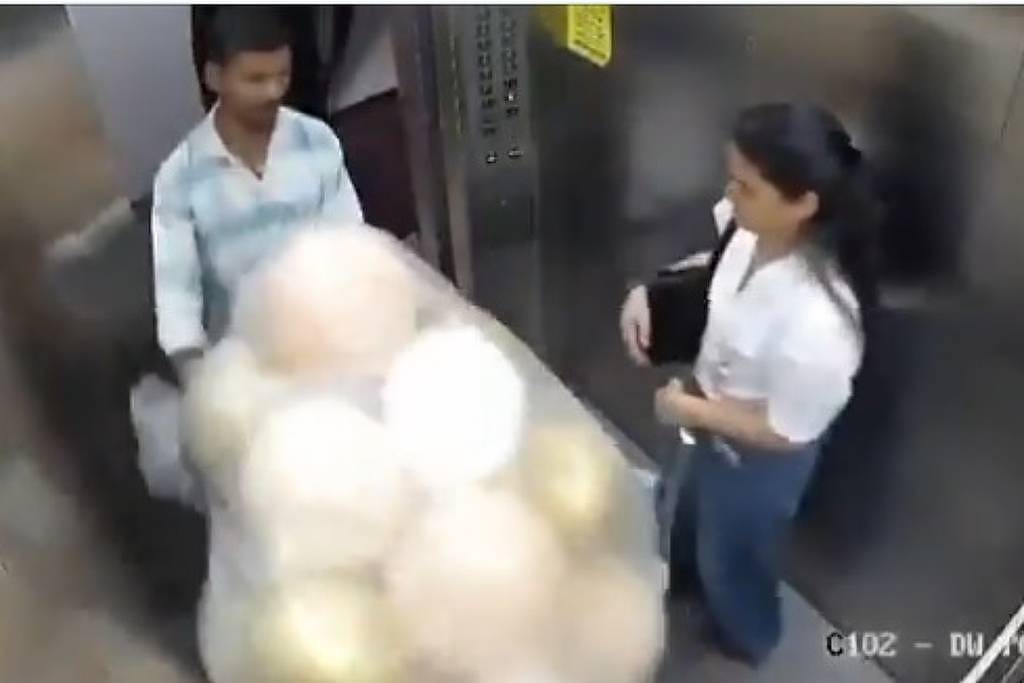 video:-explosao-de-baloes-dentro-de-elevador-deixa-feridos